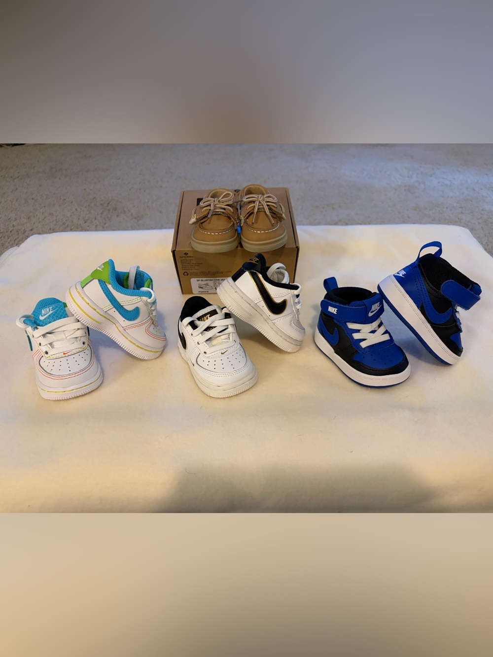 Nike infant sneaks and Sperry infant boat shoes. Bundle